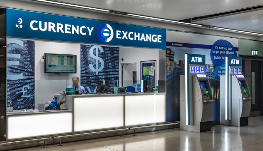 Bureau_de_change_dublin_airport_1 currency exchange unit with worker dublin airport