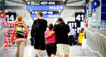 Passengers walking to US preclearance gate Passengers walking to US preclearance gate