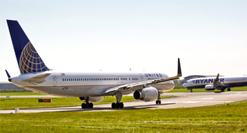 united and ryanair planes on runway united and ryanair planes on runway